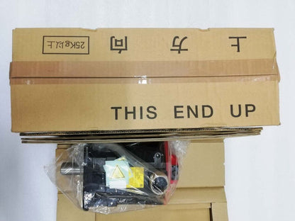 FANUC A06B-0243-B401 servo motor in packaging marked 'This End Up', 25KG以上, Industrial Automation Parts
