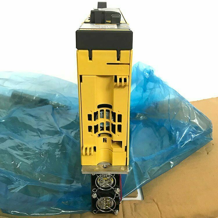 FANUC A06B-6117-H106 servo drive, yellow industrial automation component, with cooling fans, new in box.