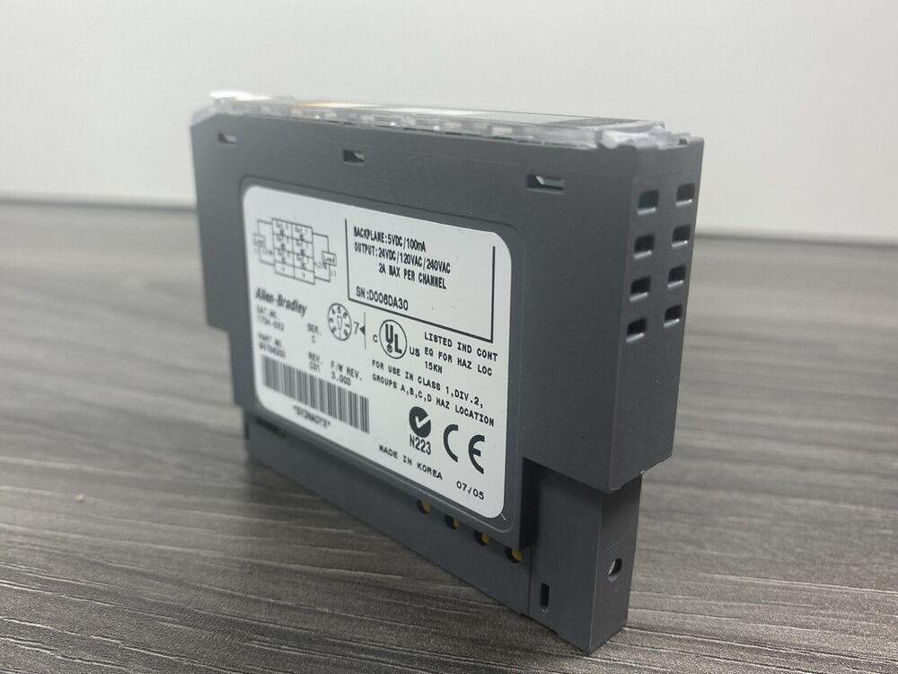 Allen-Bradley 1734-OX2 Ser C POINT I/O Module, grey, with specifications and labels.