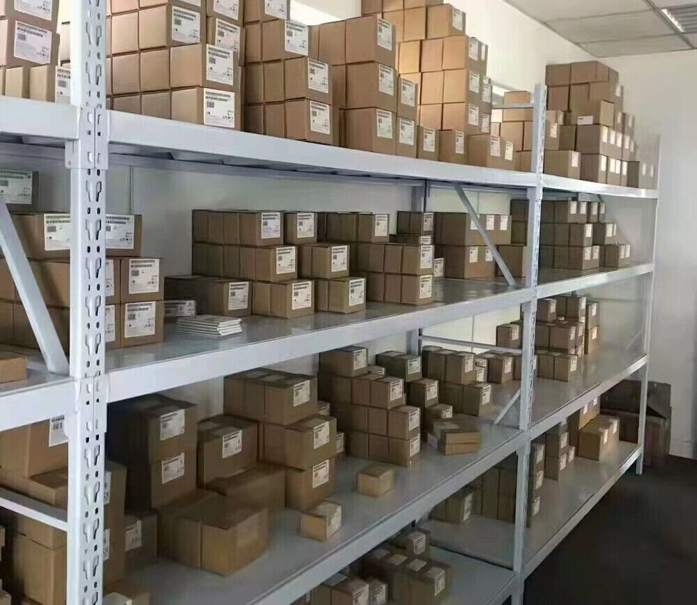 Mitsubishi FX2N-32CCL PLC Modules in stock, industrial automation parts on shelves