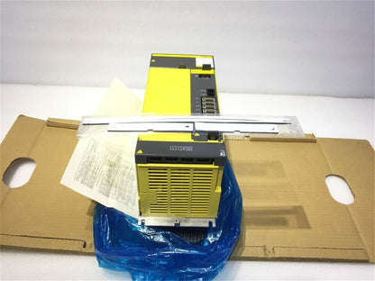 FANUC A06B-6150-H045 Servo Drive, yellow unit in box with documentation, industrial automation part.