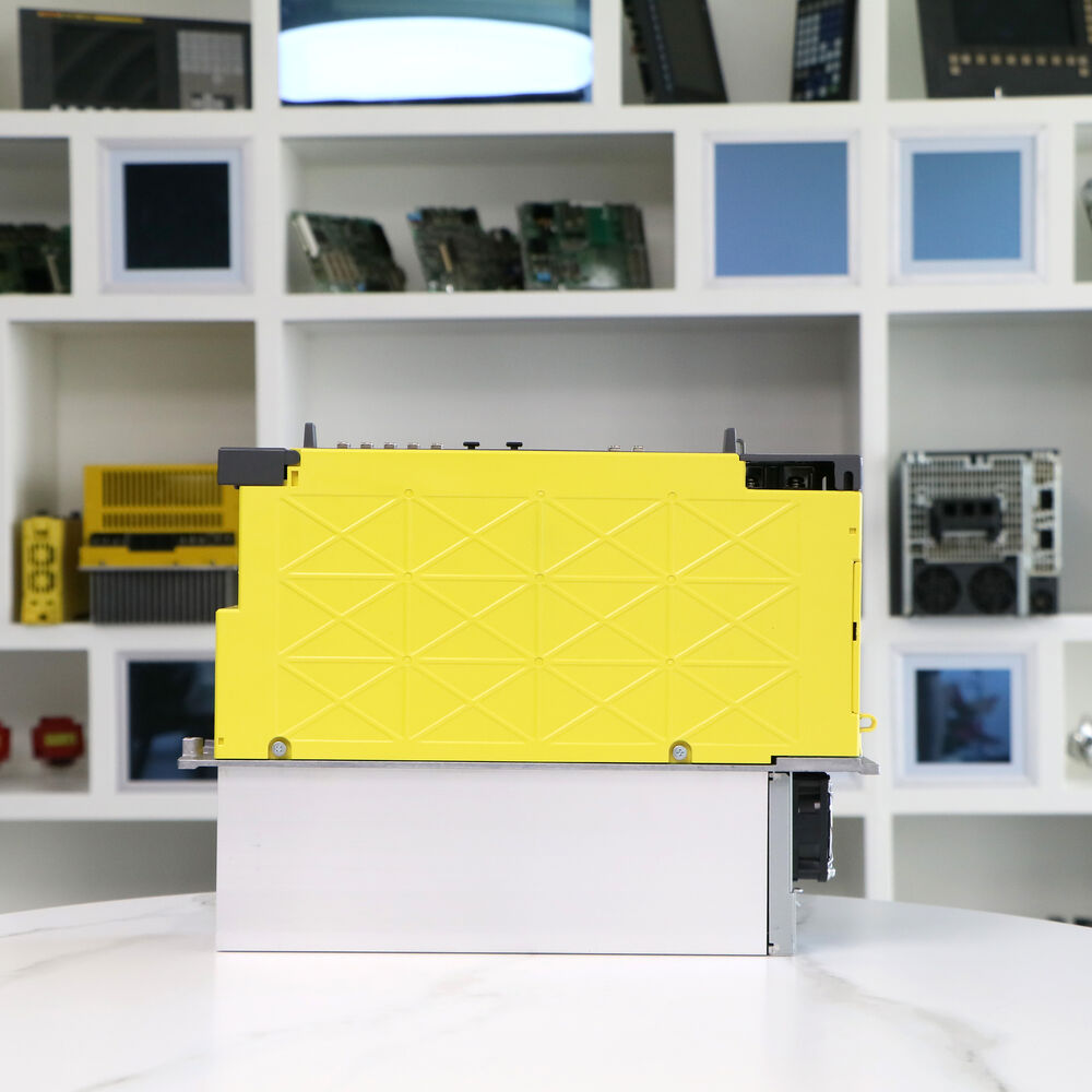 FANUC A06B-6220-H015#H600 Servo Drive Amplifier, yellow casing, white base, industrial automation part.