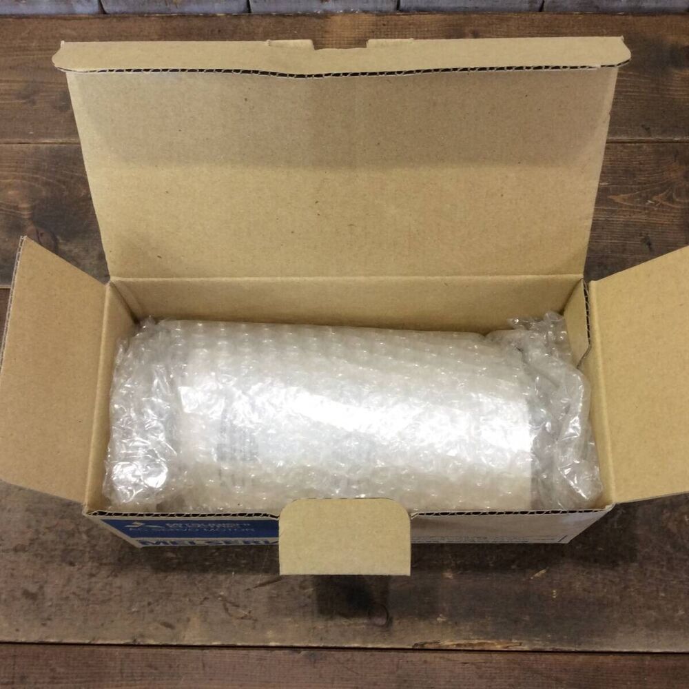 Mitsubishi HG-KR13 Servo Motor, new industrial part, bubble wrapped in shipping box.