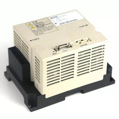 Yaskawa SGDR-SDA710A01B Servo Drive. Features CNP6, CN1, CN102 ports, warning label. Industrial automation part, ready.