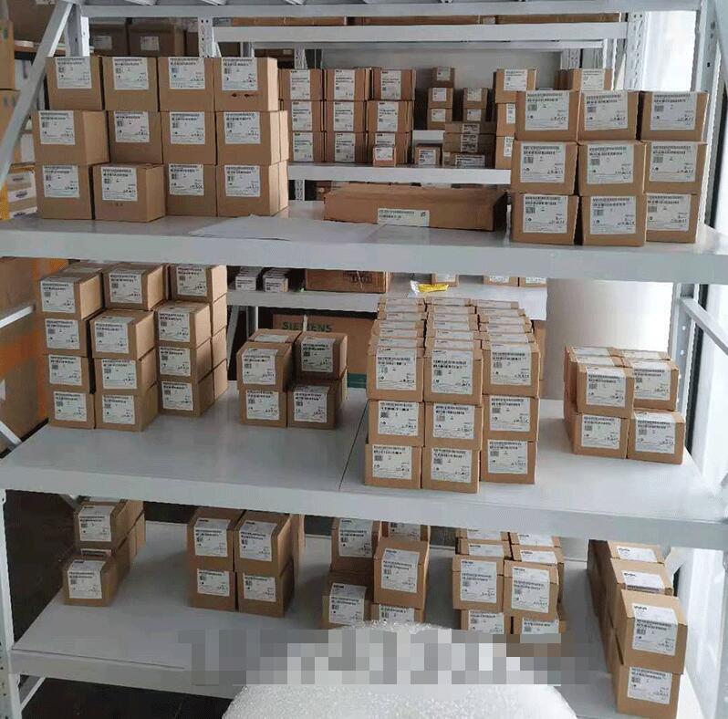 Warehouse stock of FANUC industrial automation parts, boxes on shelves, ready for fast shipping.