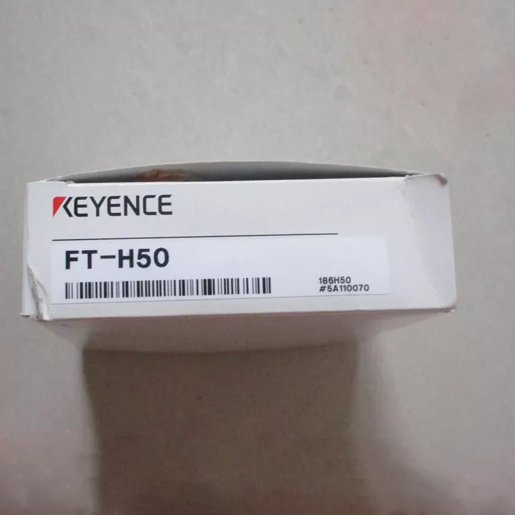 Keyence FT-H50 Temperature Sensor box, white packaging, product label with barcode and model number, fast shipping.