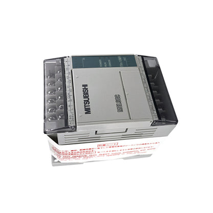 Mitsubishi FX1S-20MR-ES/UL PLC Module, MELSEC Series, industrial automation part. Label says 'NOT REMOVE THIS SHEET'.