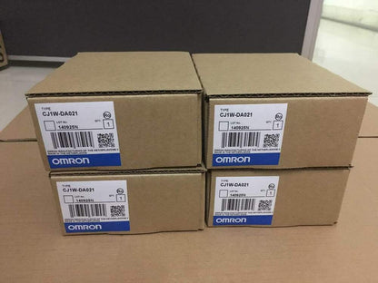 OMRON CJ1W-DA021 Output Module Boxes, new in box, featuring product labels and details.