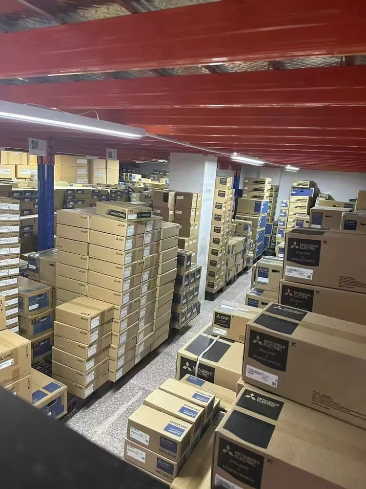Warehouse stock of Mitsubishi FX3G-40MT/ES PLC modules and other automation parts, ready for shipping.