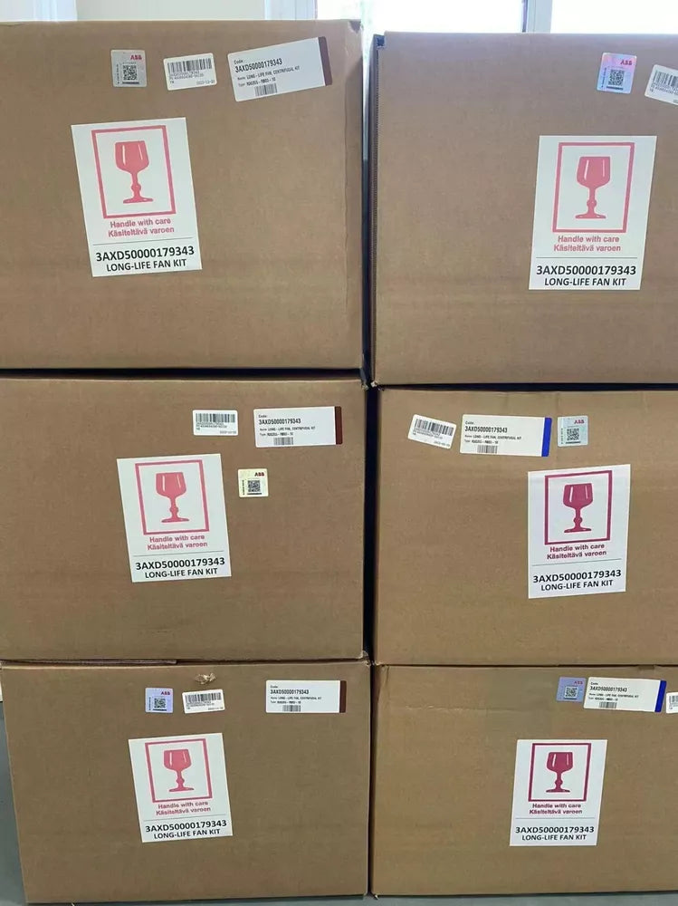 Stacked boxes of ABB ACS800 R3G355-RB03-10 fans, labeled with 'Handle with care' and product information.
