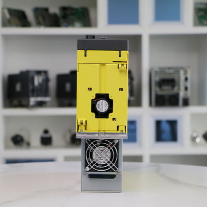 FANUC A06B-6220-H015#H600 Servo Drive Amplifier, yellow component with fan. Industrial automation part.