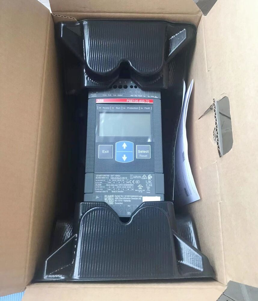 ABB PSE105-600-70 Soft Starter in box. PLC module with indicators, buttons, and display.