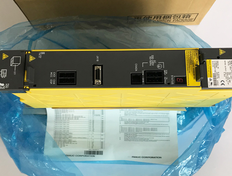 FANUC A06B-6110-H006 Servo Drive, yellow, black, and multiple ports, industrial automation part, in packaging
