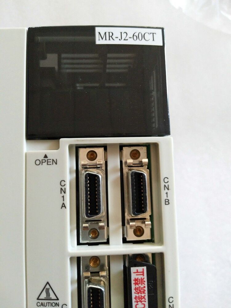 Mitsubishi MR-J2-60CT Servo Drive Unit, featuring connectors and labels, industrial automation component.