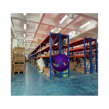 Industrial automation parts warehouse with frequency converters and other components stocked on blue shelving.