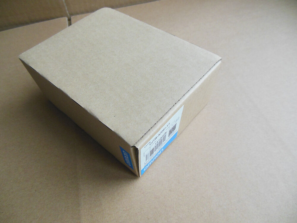 OMRON CJ1W-AD081-V1 PLC Module box, featuring product details and barcode.