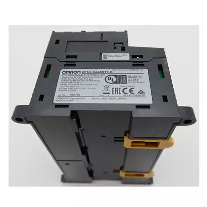 Omron CP1H-XA40DT1-D Programmable Controller Module, black with yellow accents, new condition.