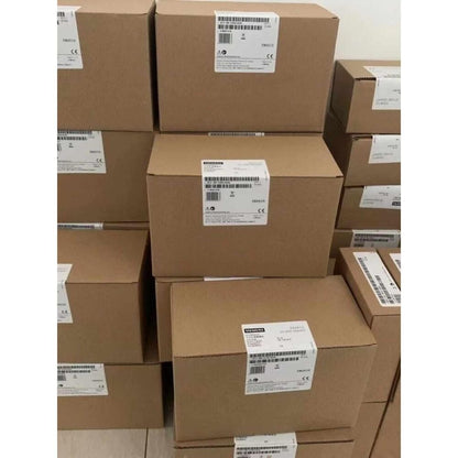 Warehouse stock of Siemens automation components in boxes, ready for shipping and industrial automation supply.