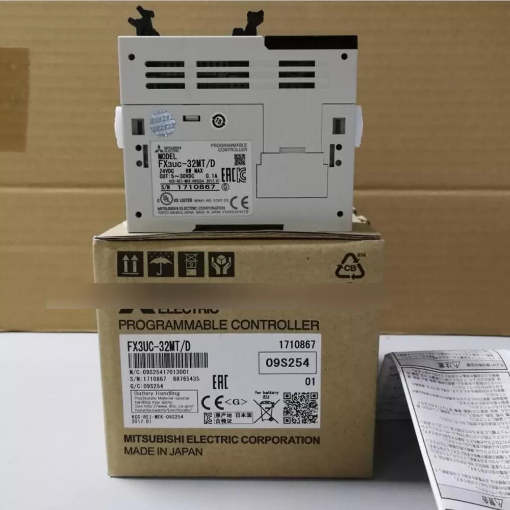 Mitsubishi FX3UC-32MT/D PLC Module on box. Industrial automation controller, Made in Japan, Programmable Controller