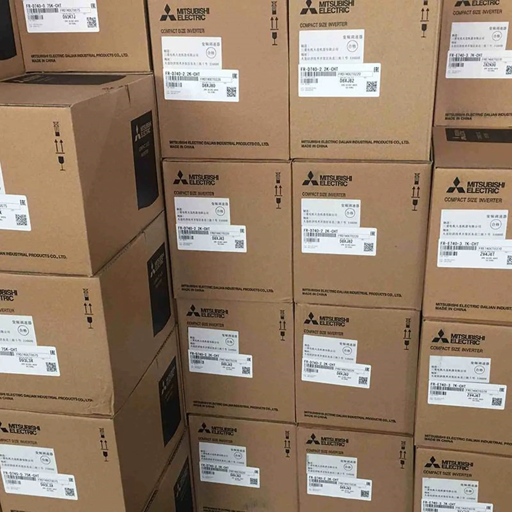 Mitsubishi Compact Size Inverter boxes stacked, new industrial automation parts