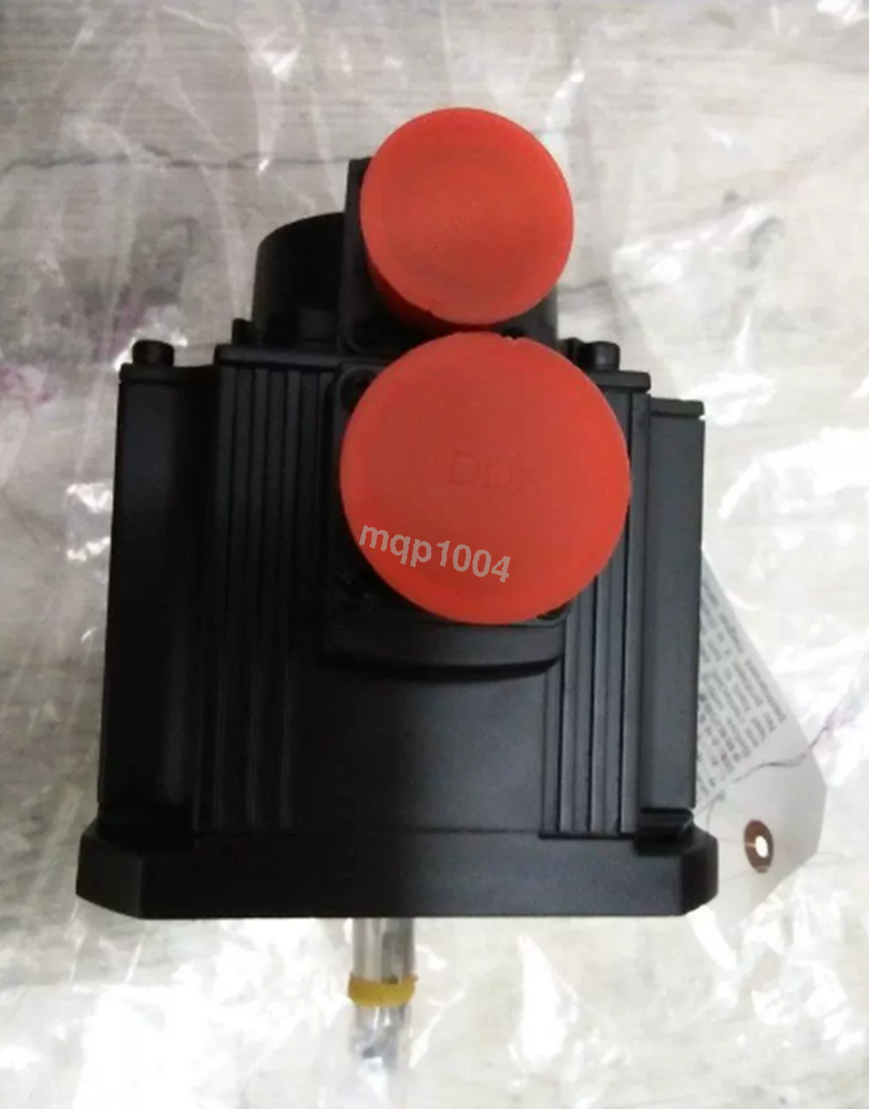 Mitsubishi HC103T-SZ servo motor with protective red caps, industrial automation part, black. Text: mq1004.