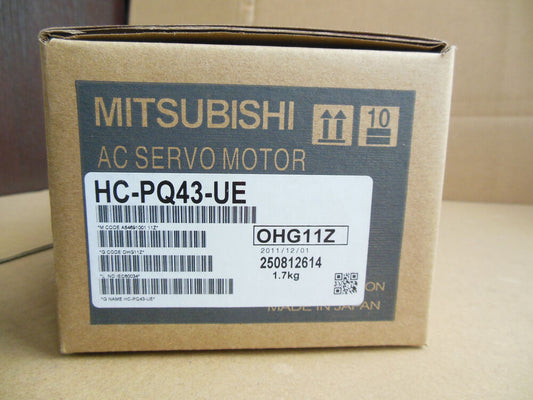 Mitsubishi HC-PQ43-UE AC Servo Motor box, brown cardboard packaging, product label with specifications, Made in Japan.