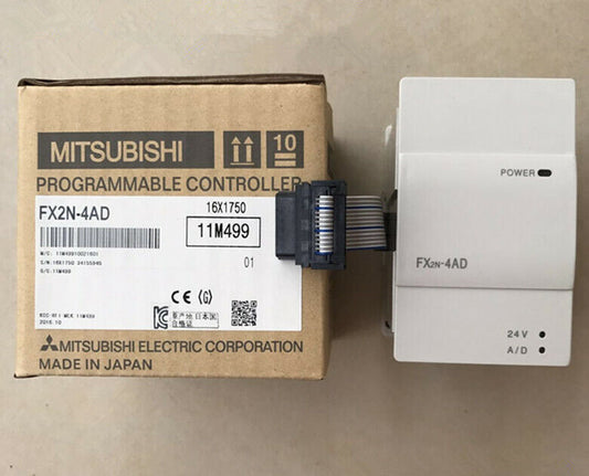 Mitsubishi FX2N-4AD programmable controller, new in box. Industrial automation PLC module.