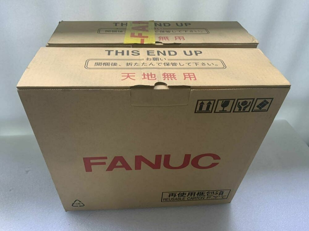 FANUC A06B-6290-H204 Servo Driver box, new in box, featuring 'This End Up' instructions for handling and 'Reusable Carton'