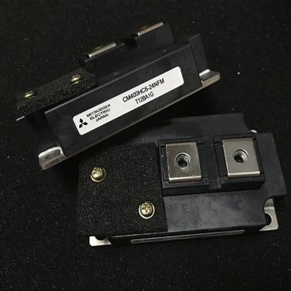 Mitsubishi CM400HC6-24NFM IGBT module, black industrial automation part with screws and plates, Japan