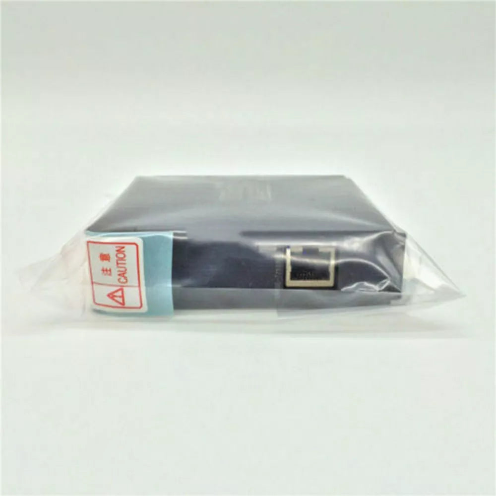 Mitsubishi QJ71MT91 PLC module, black, wrapped in plastic, with a "Caution" label, industrial automation part