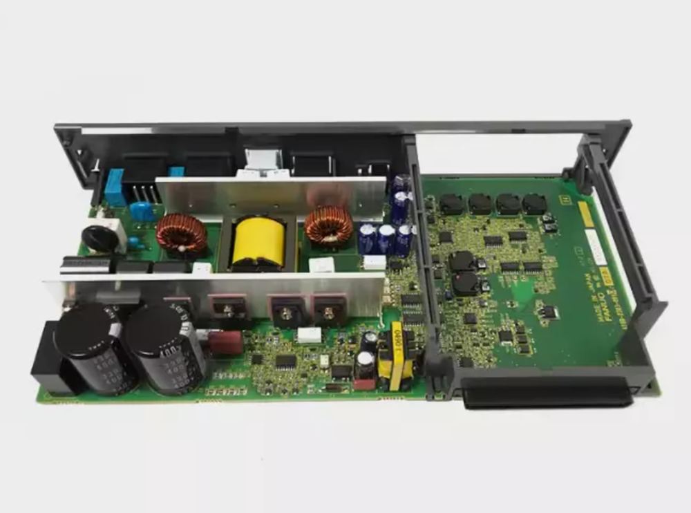 FANUC A16B-2203-0910 PLC circuit board with Made in Japan text, electronic components, for industrial automation.