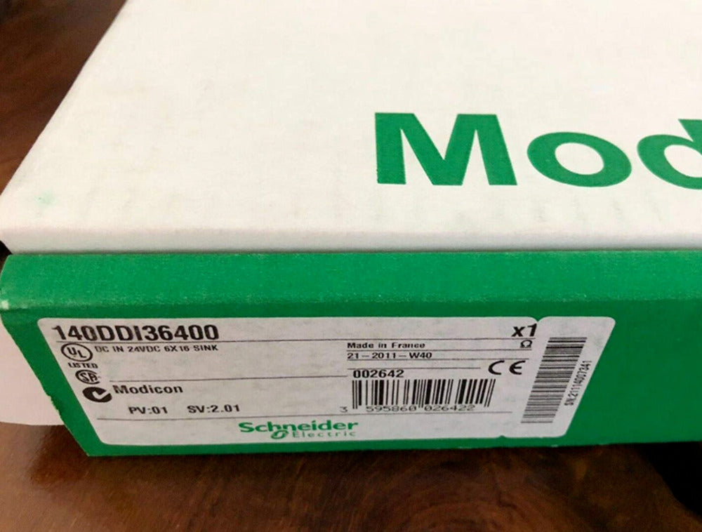 Schneider Electric 140DDI36400 PLC Module box, featuring Modicon and product details.