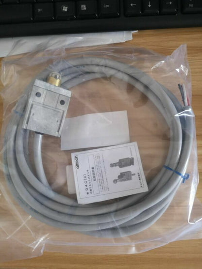 Omron D4C-1602 limit switch with cable, new product in package. Includes product information.