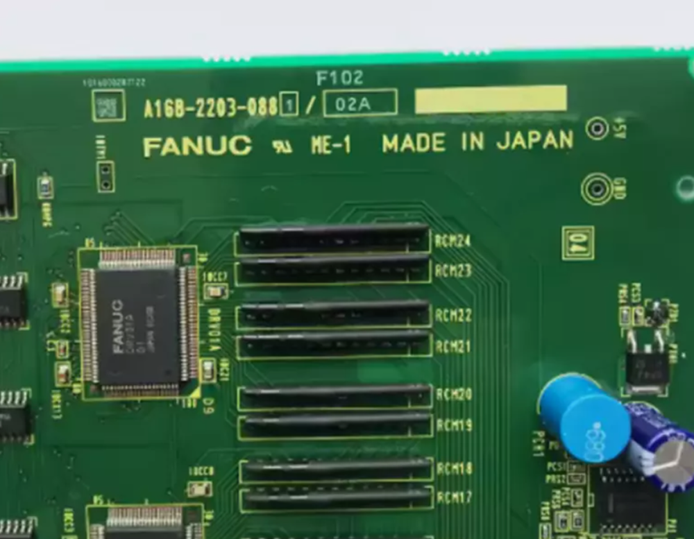 FANUC A16B-2203-0881 PCB Board, green circuit board with components, Made in Japan, industrial automation part.