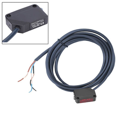 Omron E3Z-D62 photoelectric sensor with black housing, cable, and exposed wiring. Industrial automation component.