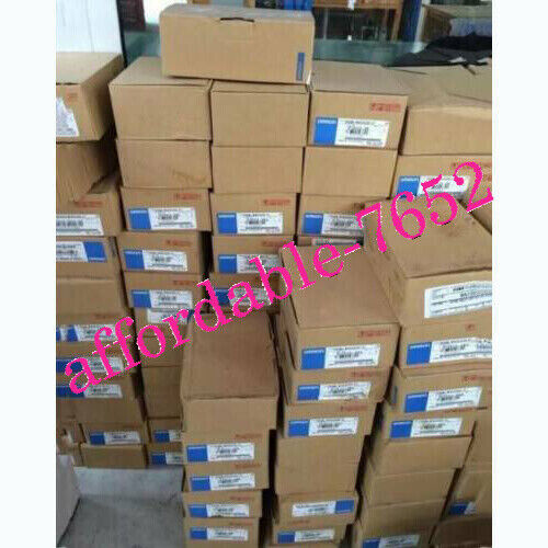 Omron CJ1M-CPU22 PLC modules stacked in boxes, 'affordable-7652' text overlaid, new condition