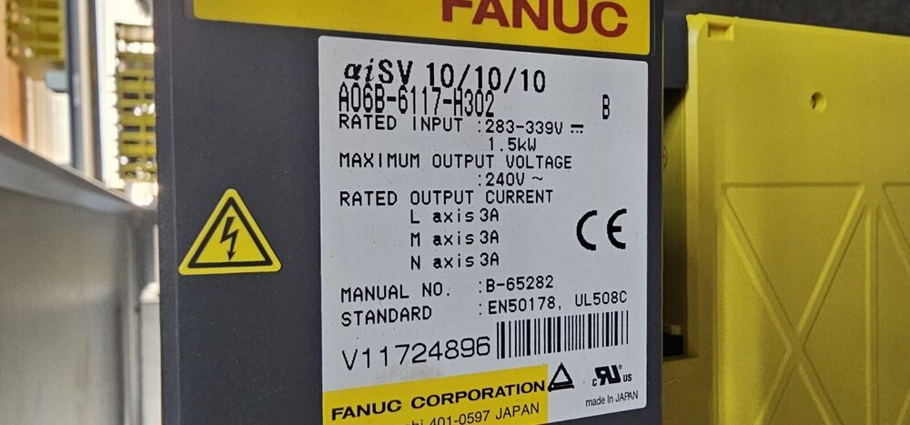 FANUC A06B-6117-H302 servo amplifier label, showing specifications, model, and voltage details.