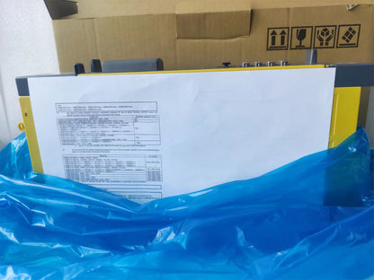 FANUC A06B-6117-H304 Servo Drive in box with specs sheet. Industrial automation part.