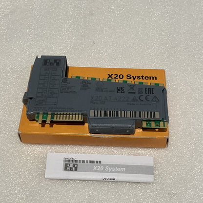 B&R X20 AT 4222 analog module Rev. X8, grey industrial automation component in orange box.