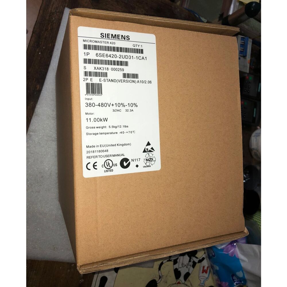 Siemens MICROMASTER 420 industrial drive, model 6SE6420-2UD31-1CA1, packaged in a cardboard box.