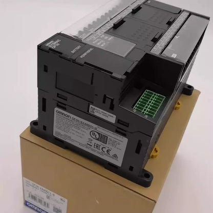Omron CP1H-XA40DT1-D PLC Module, black with green connector, new condition.