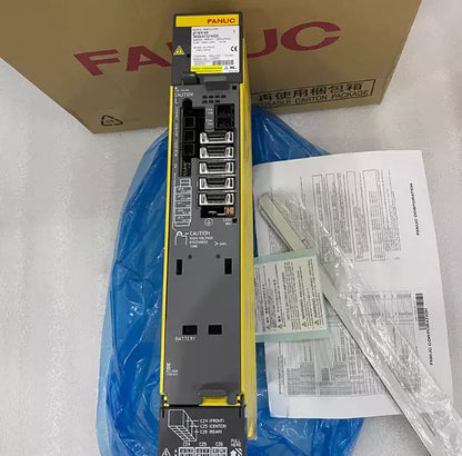 FANUC A06B-6132-H003 Servo Drive, yellow and gray enclosure, industrial automation part, new condition.