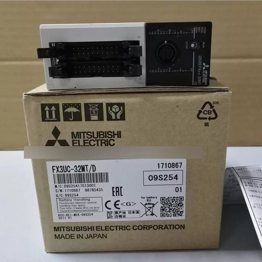 Mitsubishi FX3UC-32MT/D PLC module. Industrial automation part with box including details and manufacturing information.