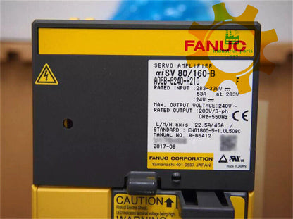 FANUC A06B-6240-H210 servo amplifier, industrial automation component with safety labels and specs.
