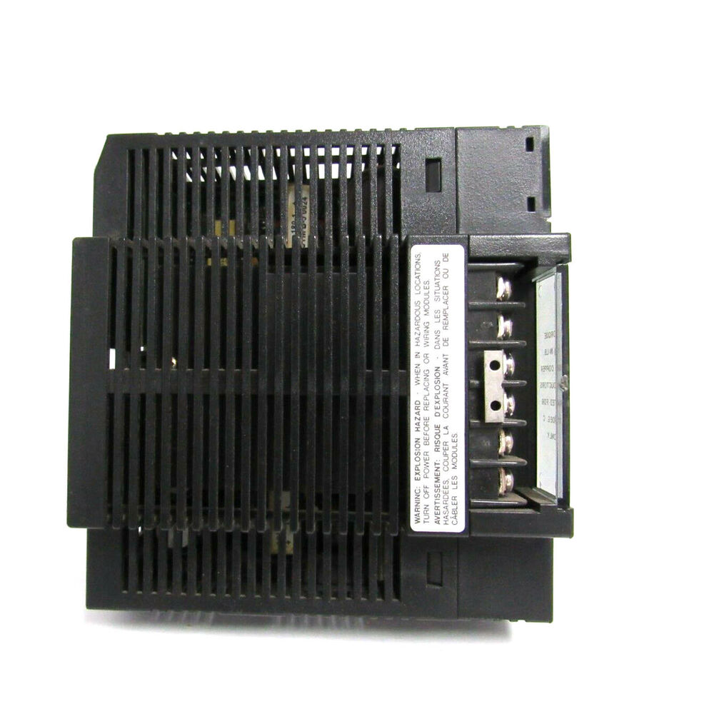 FANUC IC693PWR330 Power Supply Module, black industrial automation equipment, with warning label.