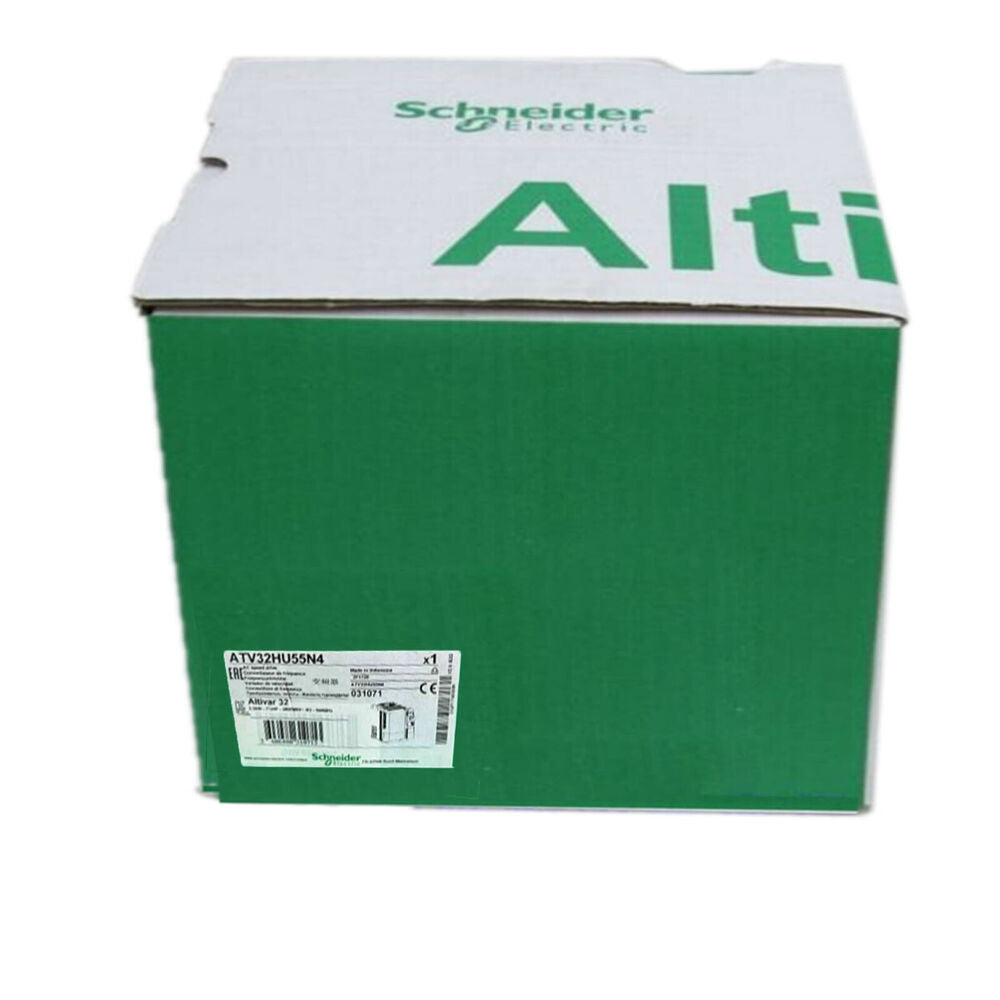 Schneider ATV32HU55N4 inverter box, green and white, new in box, industrial automation equipment.