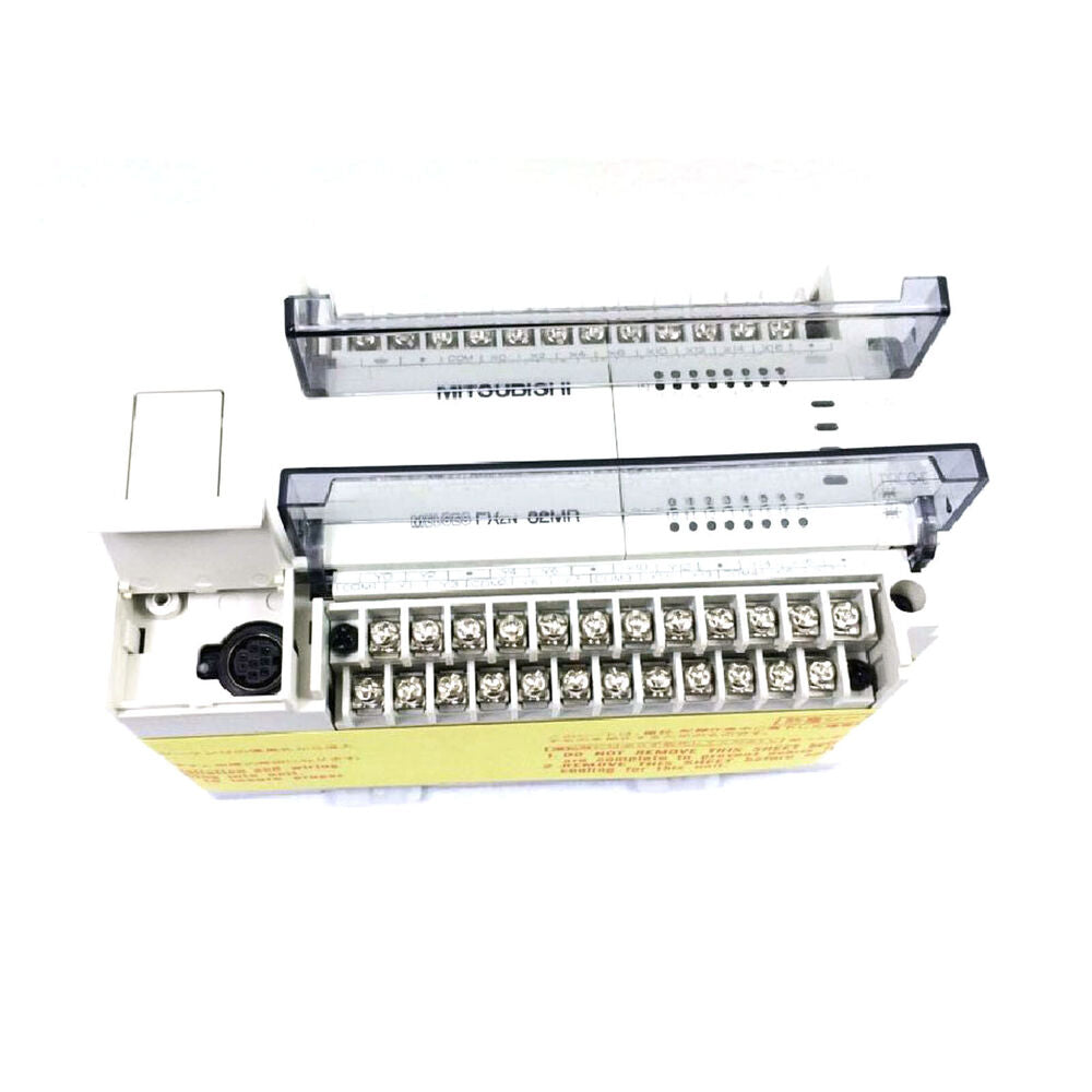 Mitsubishi FX2N-16MR-001 PLC Programmable Controller, clear protective covers. Features terminal blocks and connectors.