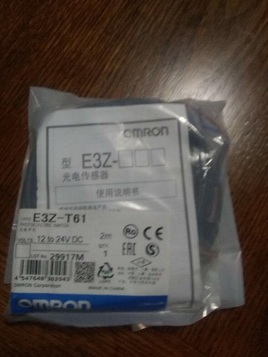 Omron E3Z-T61 Photoelectric Switch in packaging. Features product info, '12 to 24V DC', and the OMRON logo.