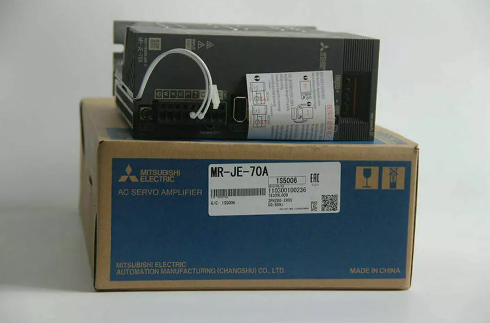 Mitsubishi MR-JE-70A AC Servo Amplifier on its box, industrial automation part for sale