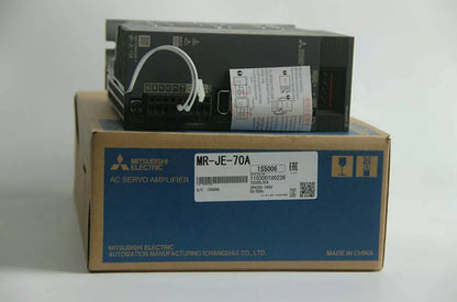 Mitsubishi MR-JE-70A AC Servo Amplifier on its box, industrial automation part for sale